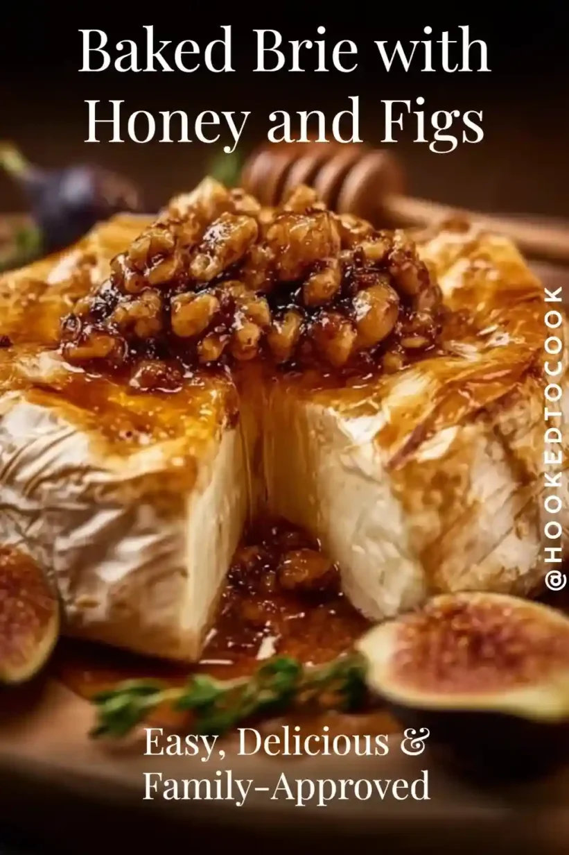 Baked Brie topped with honey, figs, and walnuts on a wooden board, warm and melty.