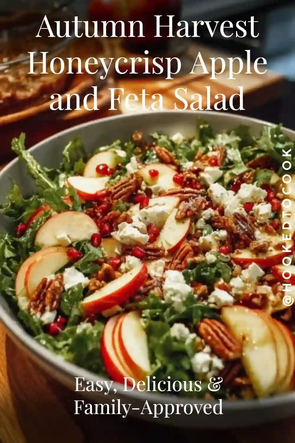 Honeycrisp Apple and Feta Salad in a bowl with pecans, pomegranate, and kale