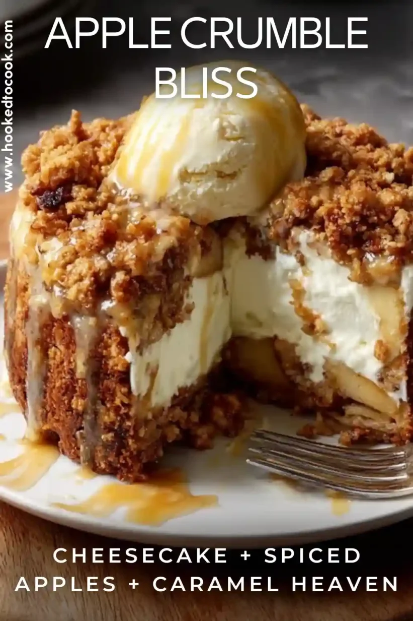 Apple Crumble Cheesecake topped with ice cream and caramel drizzle on a plate.