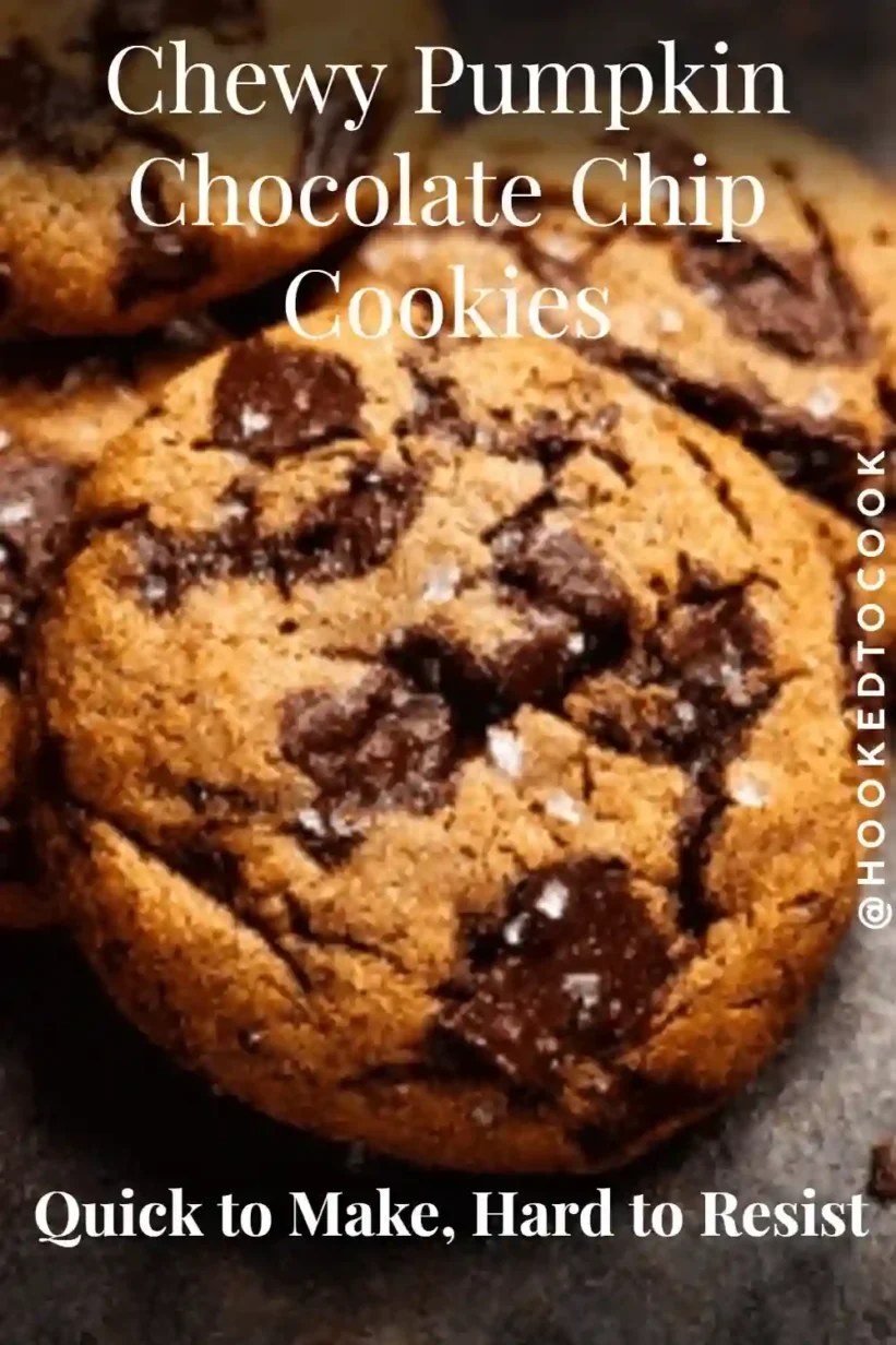 Chewy pumpkin chocolate chip cookies with dark chocolate chunks and sea salt on top.