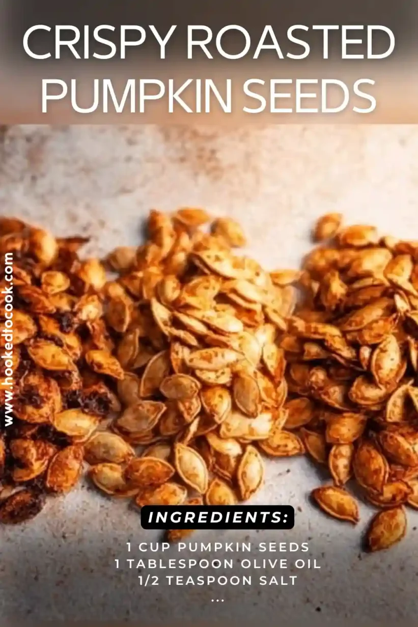 Roasted pumpkin seeds on a countertop, crispy and golden from the oven.