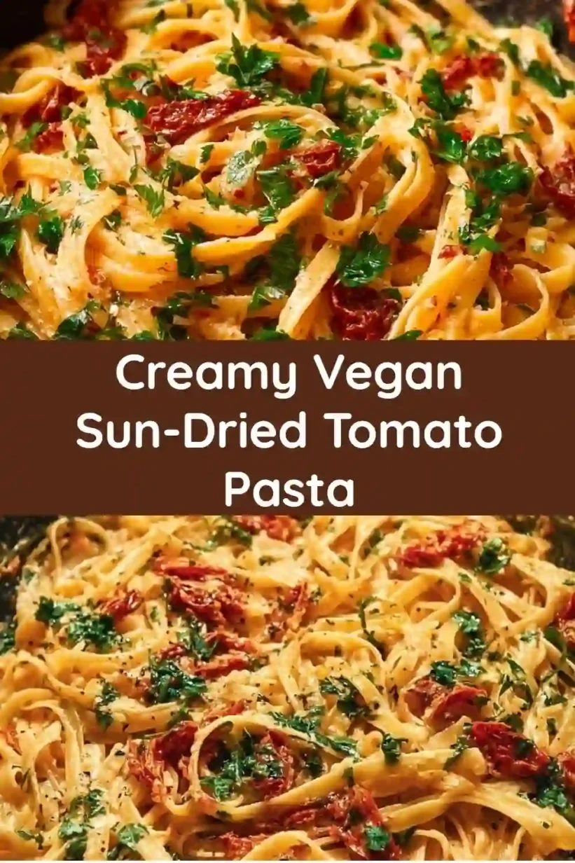 Creamy Vegan Sun-Dried Tomato Pasta garnished with fresh basil and red pepper flakes.