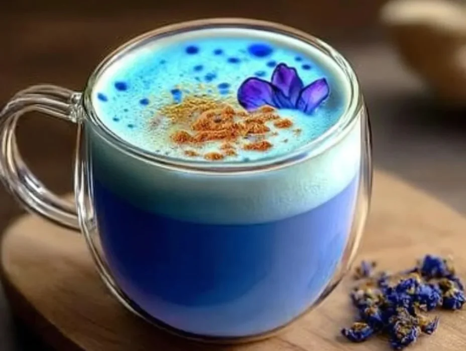 Cup of Moon Milk Tea with calming herbs and a sprinkle of stars