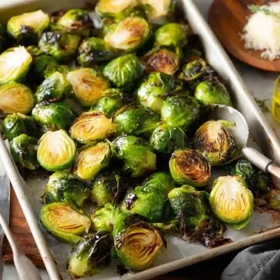 Plate of roasted Brussels sprouts seasoned and ready to serve