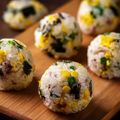 Spam Rice Ball featuring a fusion of flavors and savory ingredients.