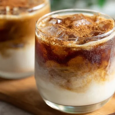 Delicious Apple Crisp Macchiato topped with whipped cream and caramel