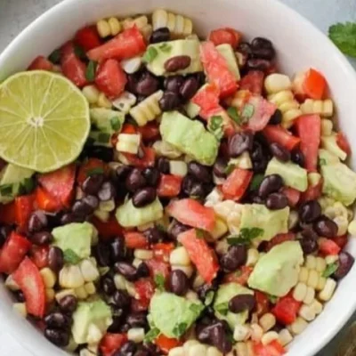Delicious black bean and corn salad served in a bowl.