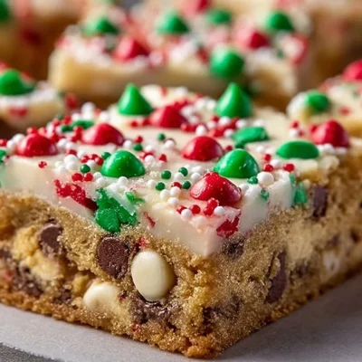 Delicious Christmas cookie bars decorated with festive sprinkles