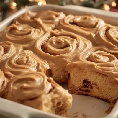 Delicious holiday cinnamon rolls with gingerbread frosting on top
