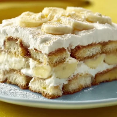 Delicious banana tiramisu layered dessert with bananas and mascarpone cream