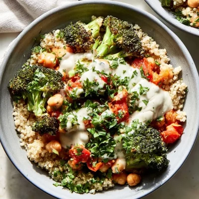 Harissa Chickpea and Broccoli Bowl with Creamy Garlic Sauce