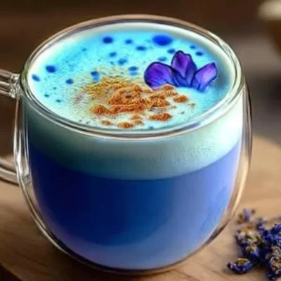 Cup of Moon Milk Tea with calming herbs and a sprinkle of stars