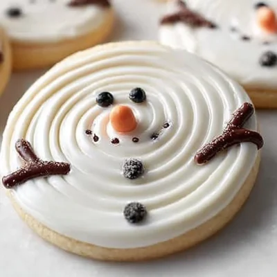 Decorated Christmas sugar cookies with festive designs.