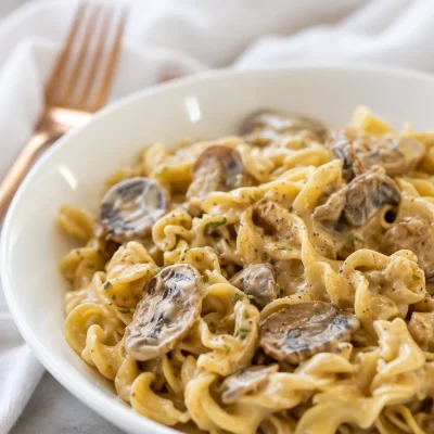 One-Pot Mushroom Stroganoff Pasta with creamy sauce and mushrooms in a bowl.