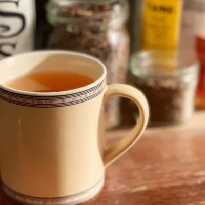 A cup of fragrant spiced tea with aromatic spices and herbs