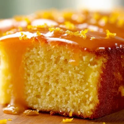 Sicilian Whole Orange Cake served on a rustic wooden table