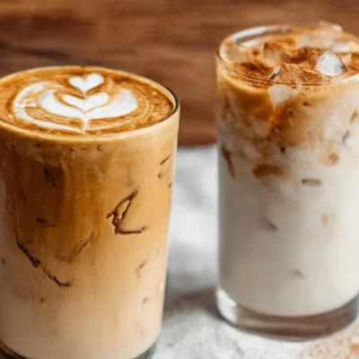 Creamy Vanilla Protein Latte with a sprinkle of cinnamon on top