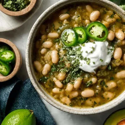 Bowl of Vegan Chili Verde Soup garnished with fresh cilantro