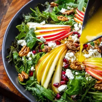 Winter Pear Salad featuring fresh pears, greens, and a light dressing.